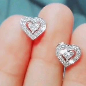 CZ PAVE HEARTS WITH CENTER CZ STONE. POST EARRINGS.